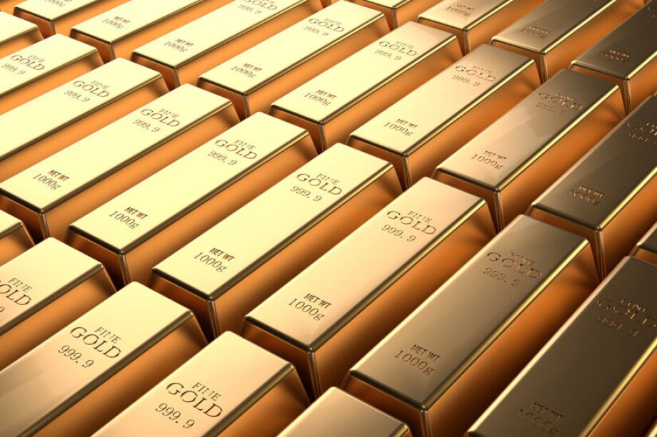 Gold slides to seven-month low